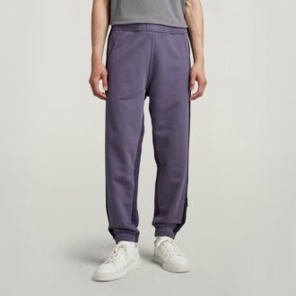 Pantaloni de trening conici cu bandă color block