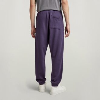 Pantaloni de trening conici cu bandă color block
