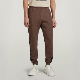 Pantaloni de trening cu bandă cu logo