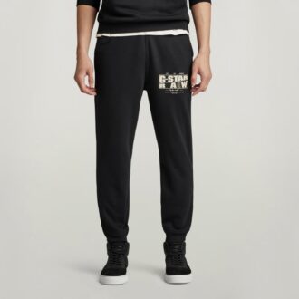 Pantaloni de trening cu logo oblic